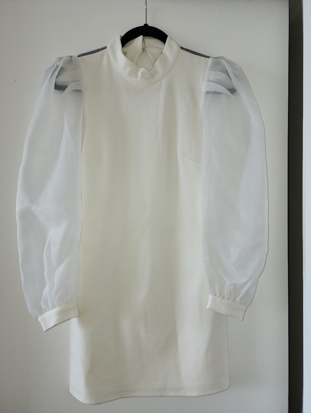 NBD Black Tag on White Garment Size S